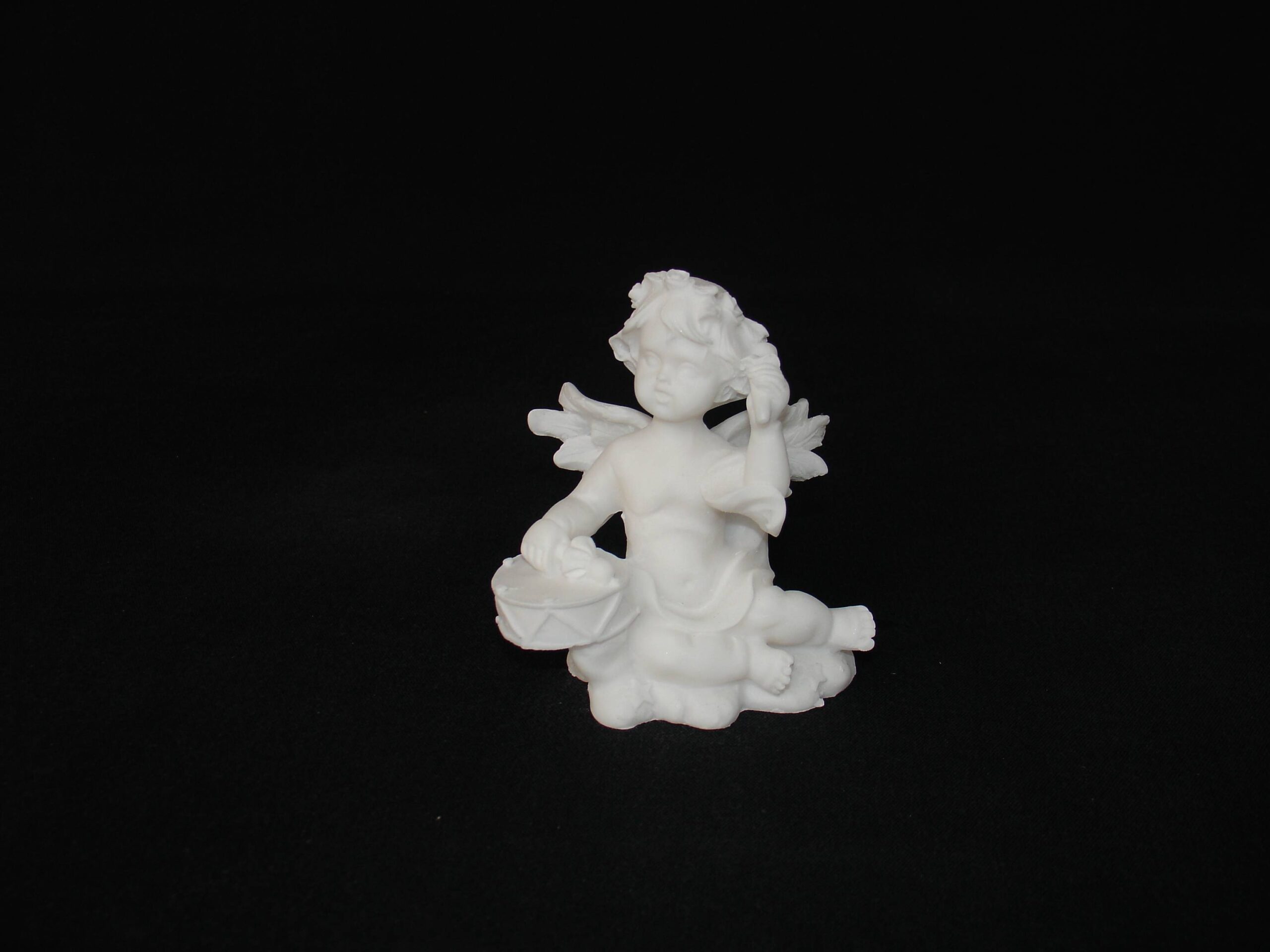 Angel playing drums statue — image 2