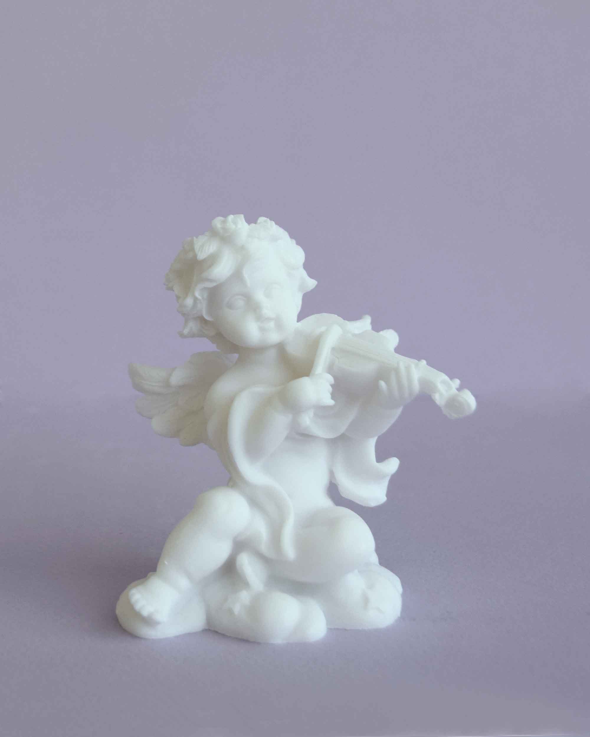 Angel playing violin statue — image 4