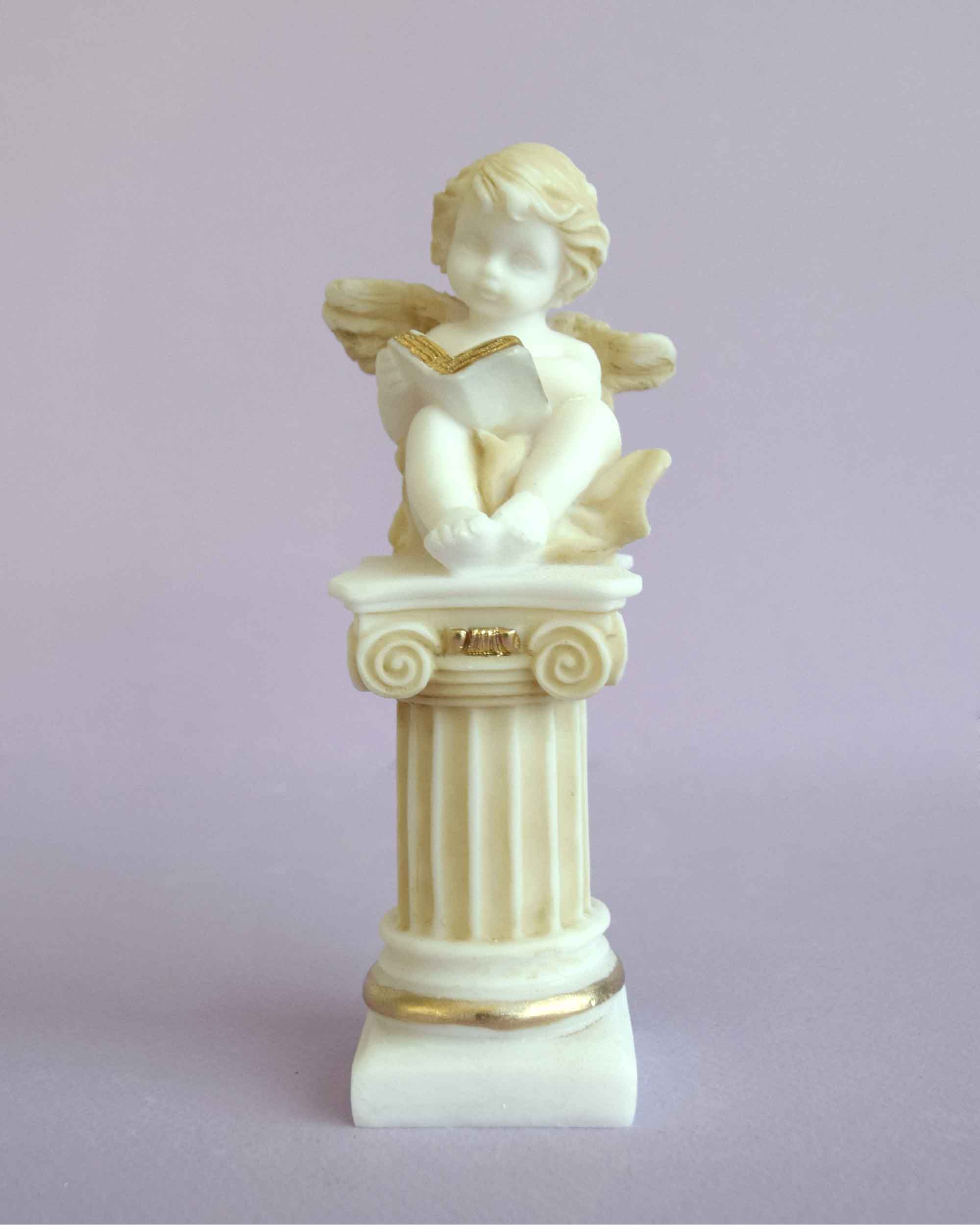 Angel sitting on a column statue — image 3
