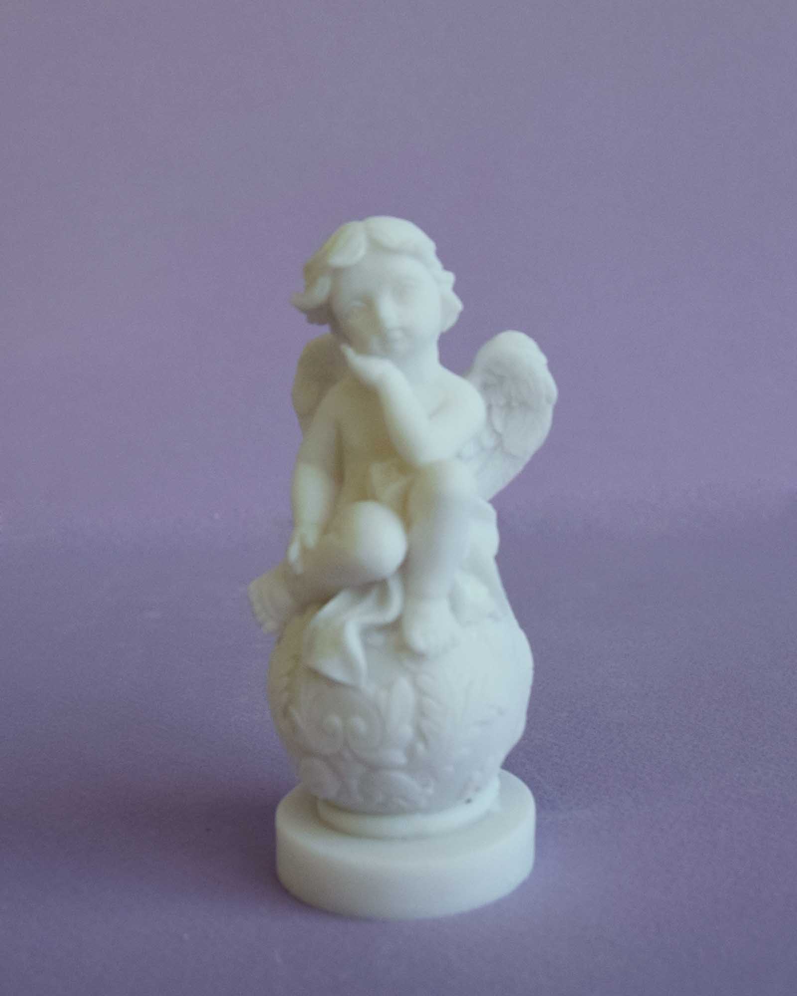 Angel sitting on a sphere statue type 1 — image 2