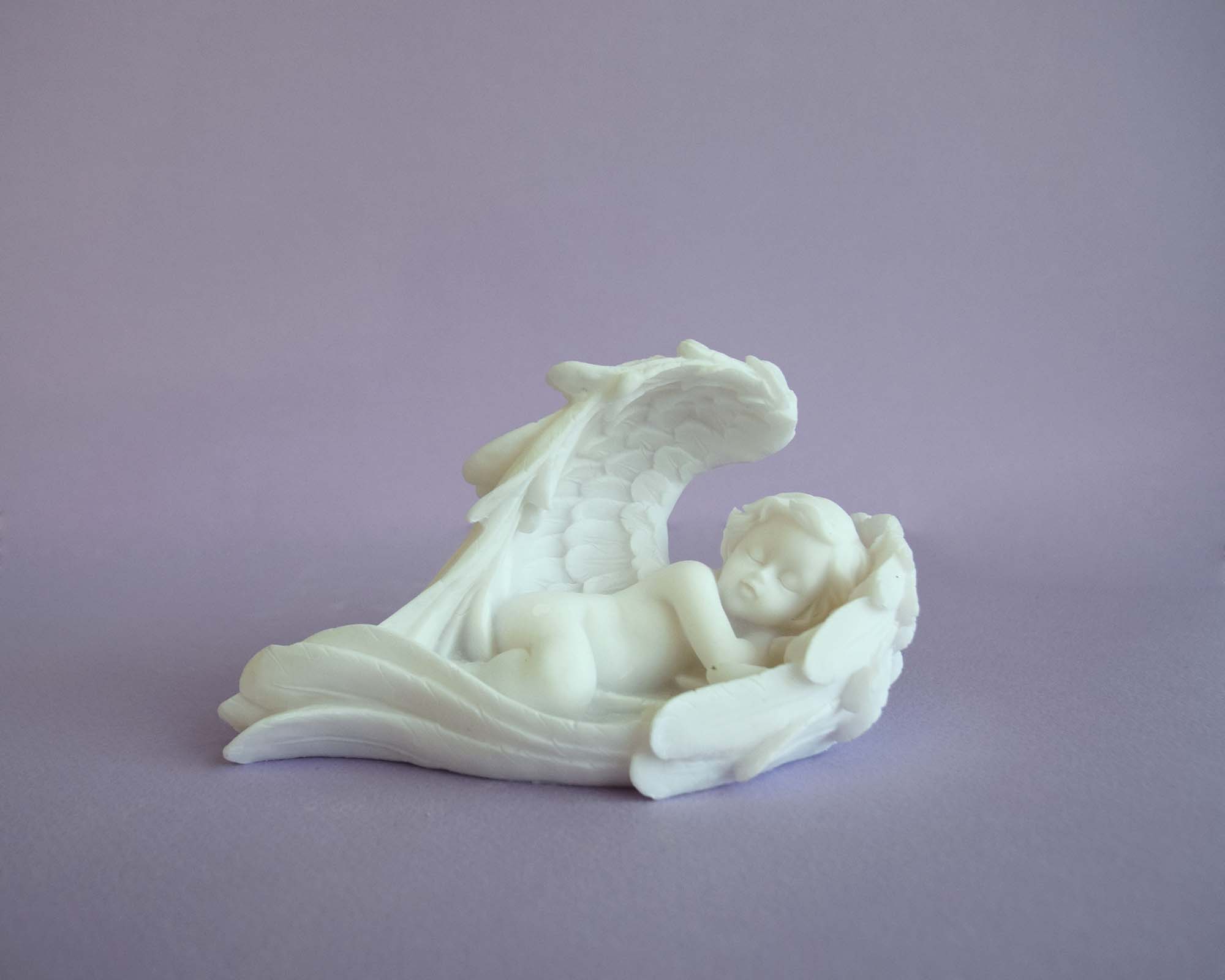 Angel sleeping right view statue — image 2