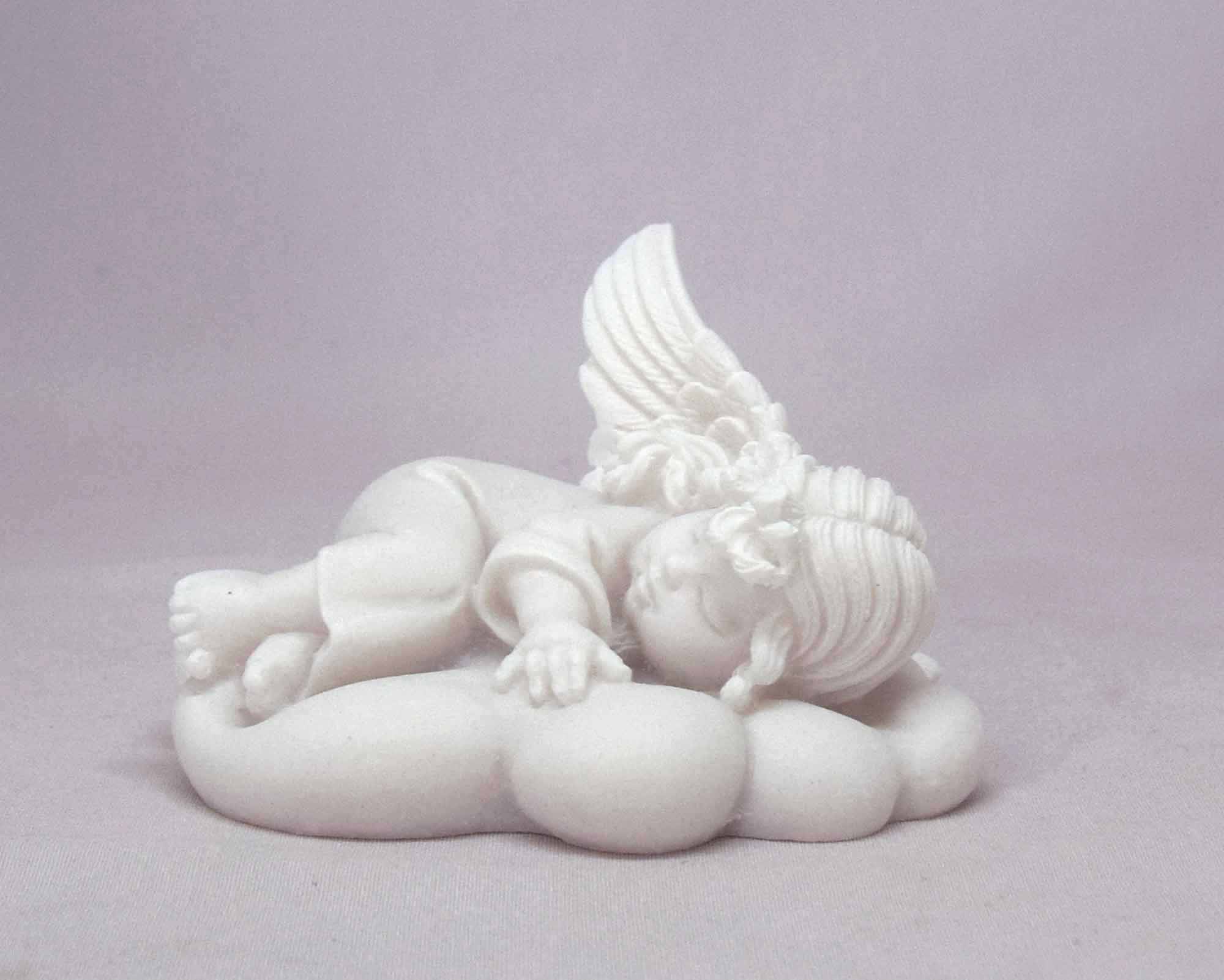 Angel sleeps on a cloud statue — image 4