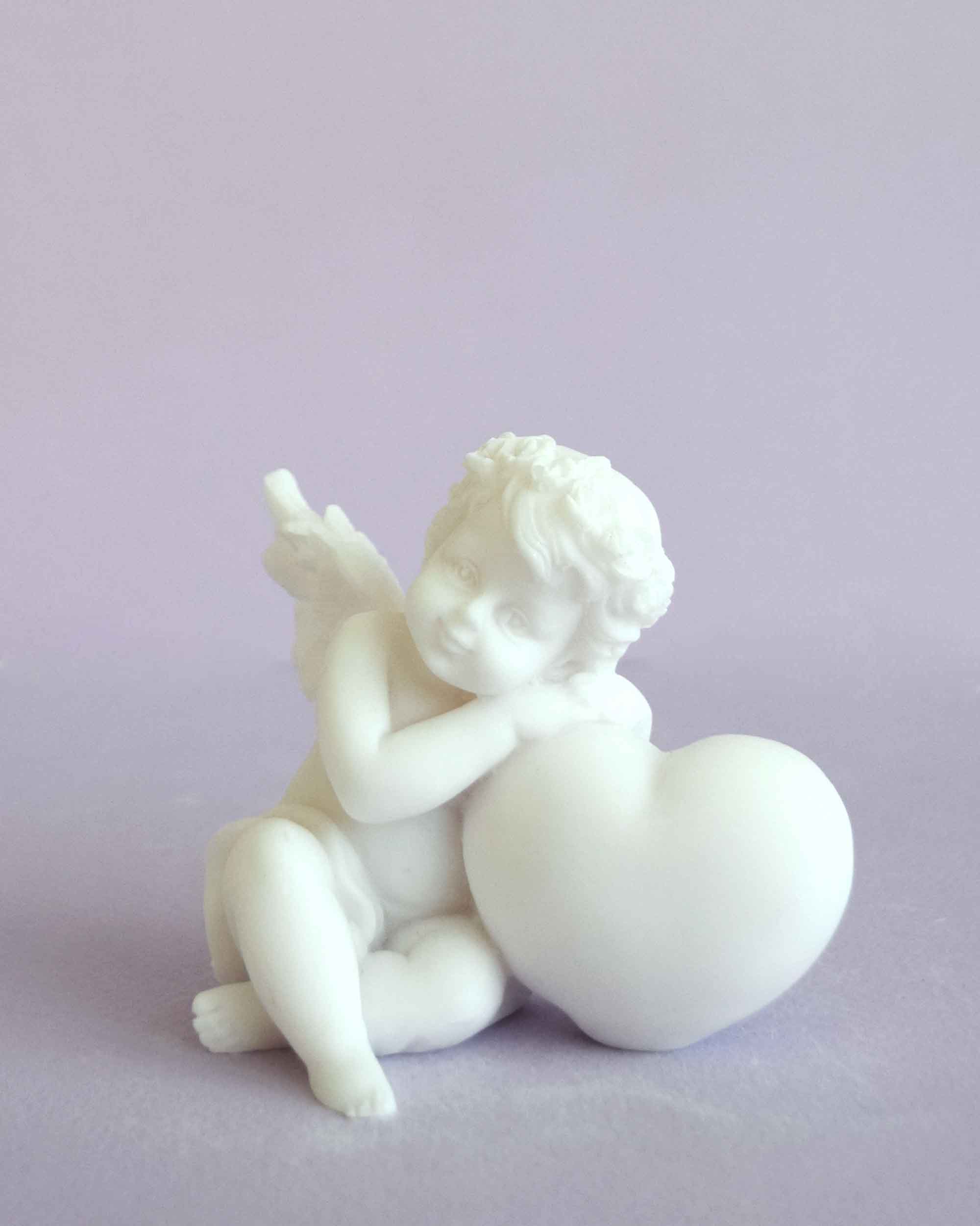 Angel with a heart right view statue — image 2