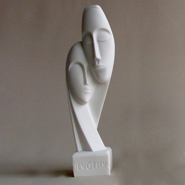 Devotion statue of a man and a woman — image 2