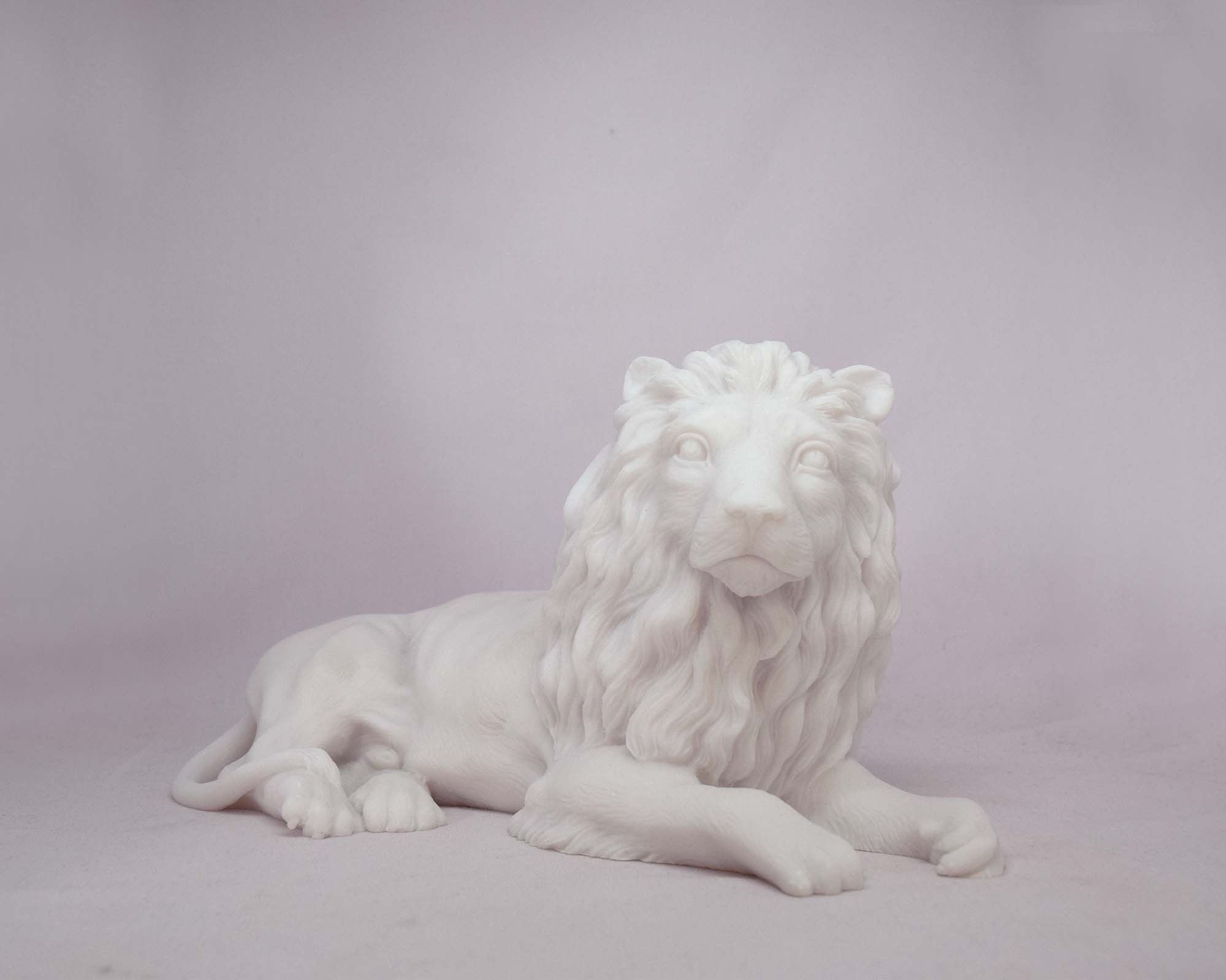 Lion lying down statue — image 2