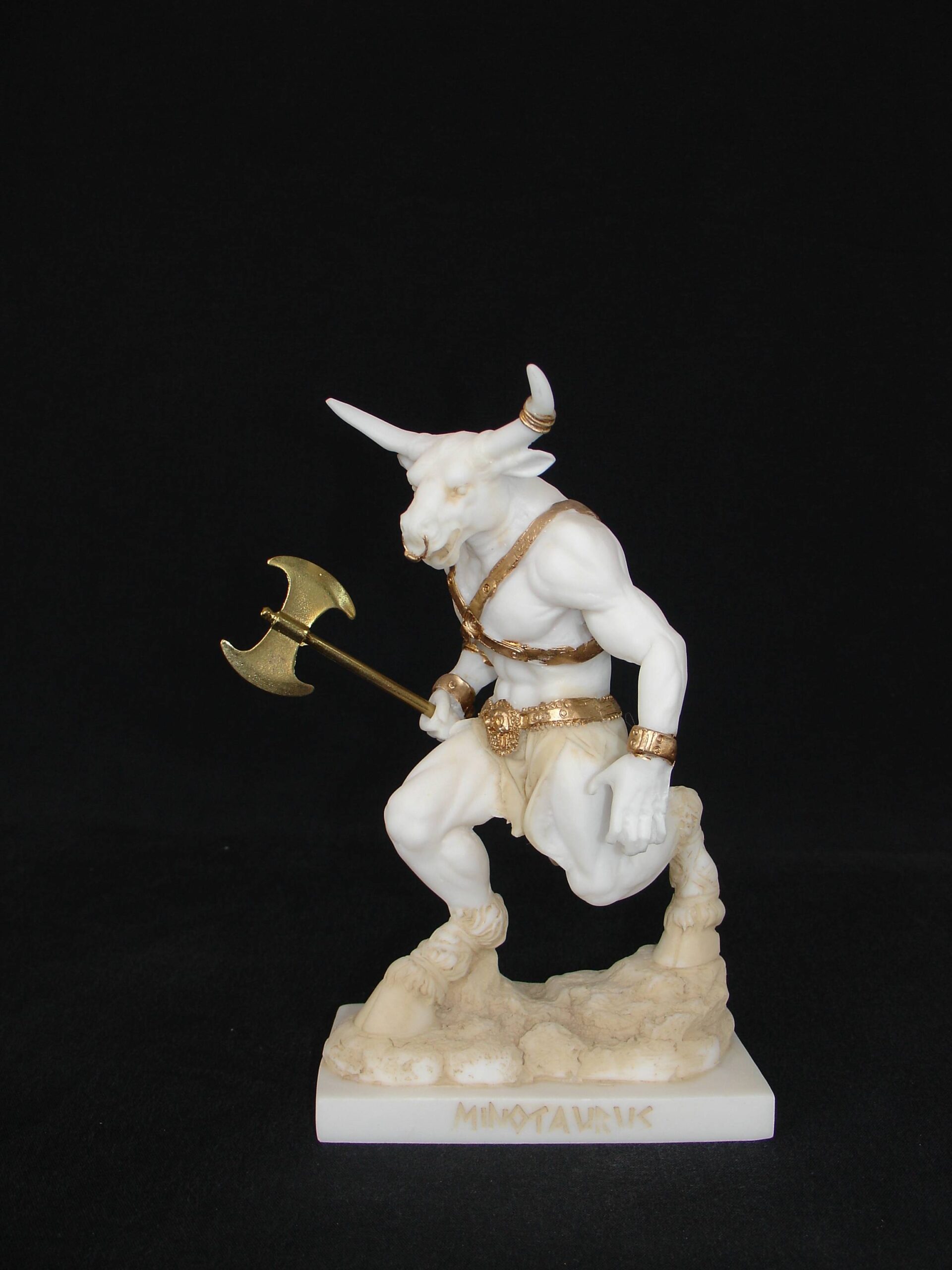 Minotaur statue holding a double-edged axe — image 2