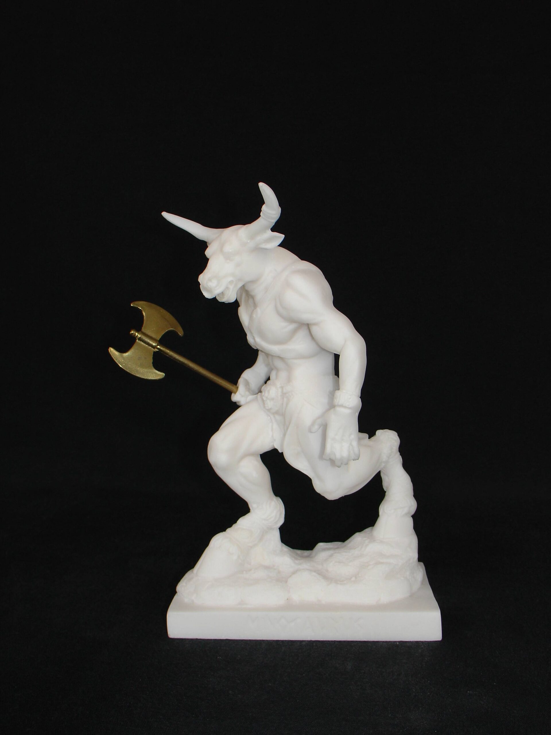 Minotaur statue holding a double-edged axe — image 3