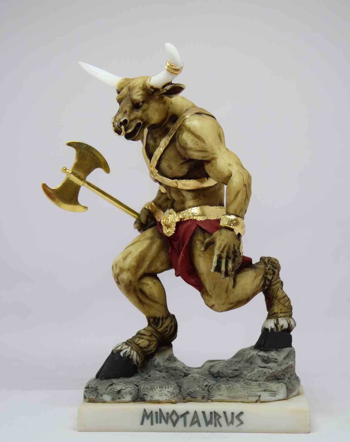 Minotaur statue holding a double-edged axe