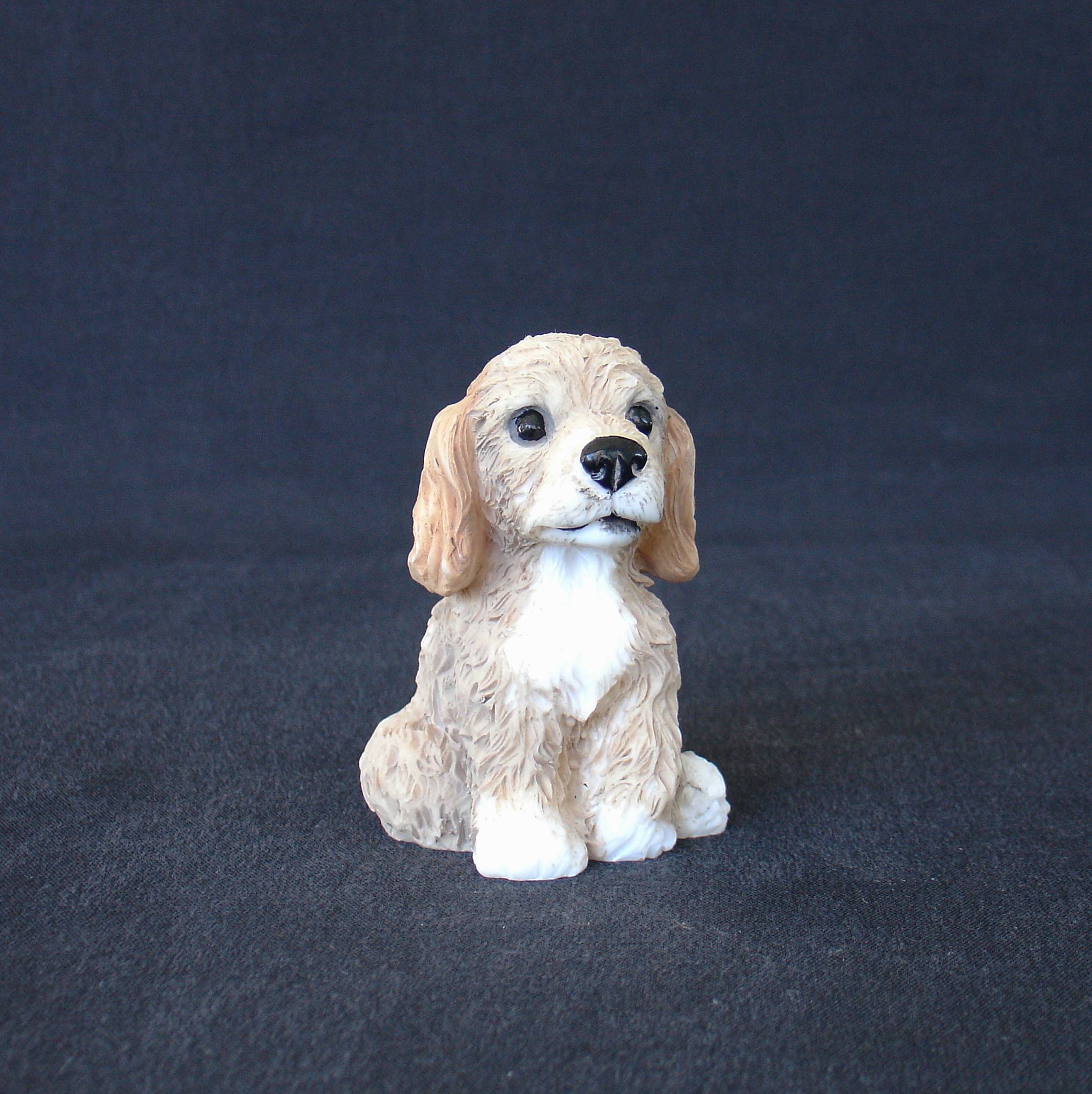 Poodle pet dog statue sitting on the floor