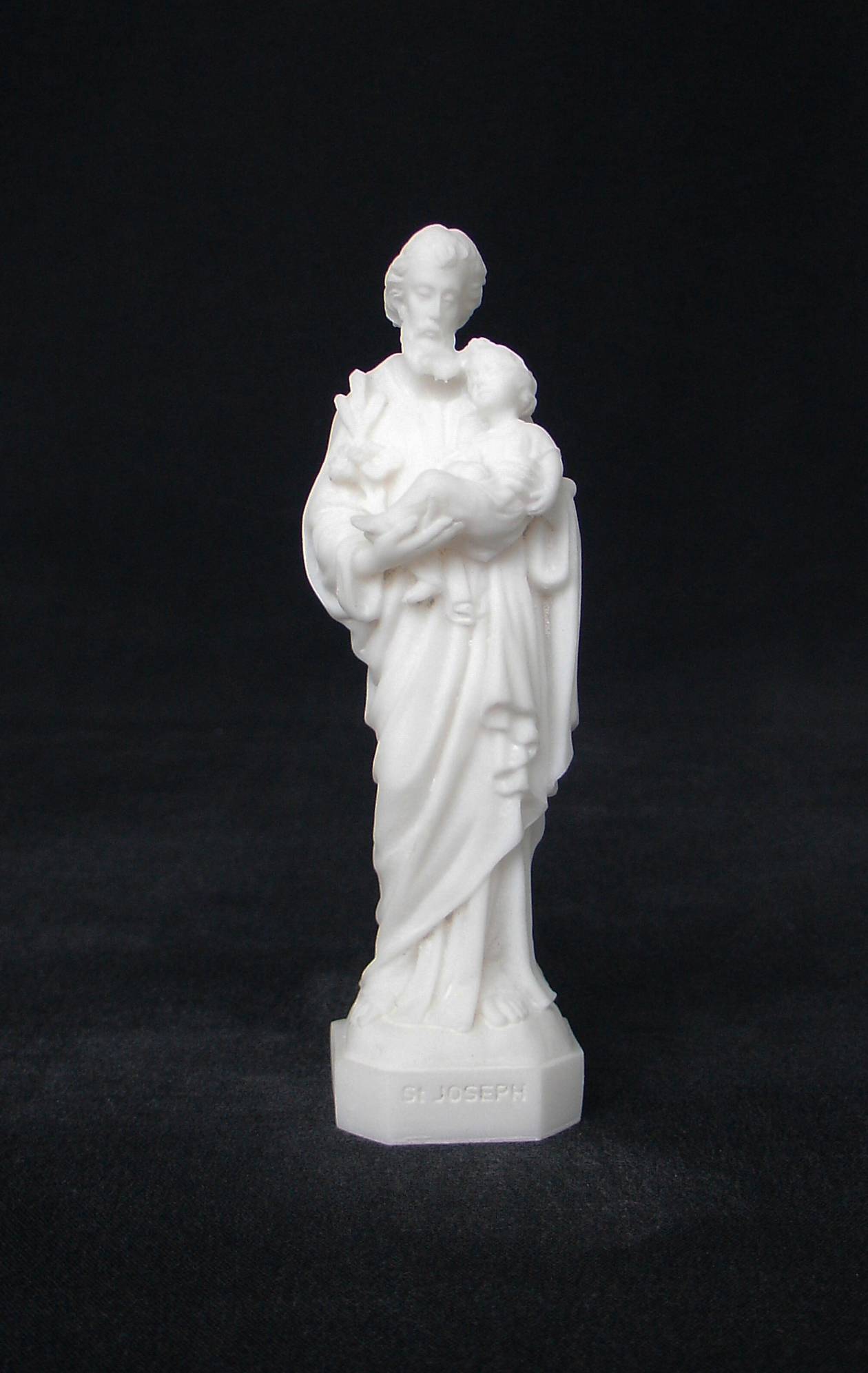 Saint Joseph holding baby Jesus in his both hands — image 2