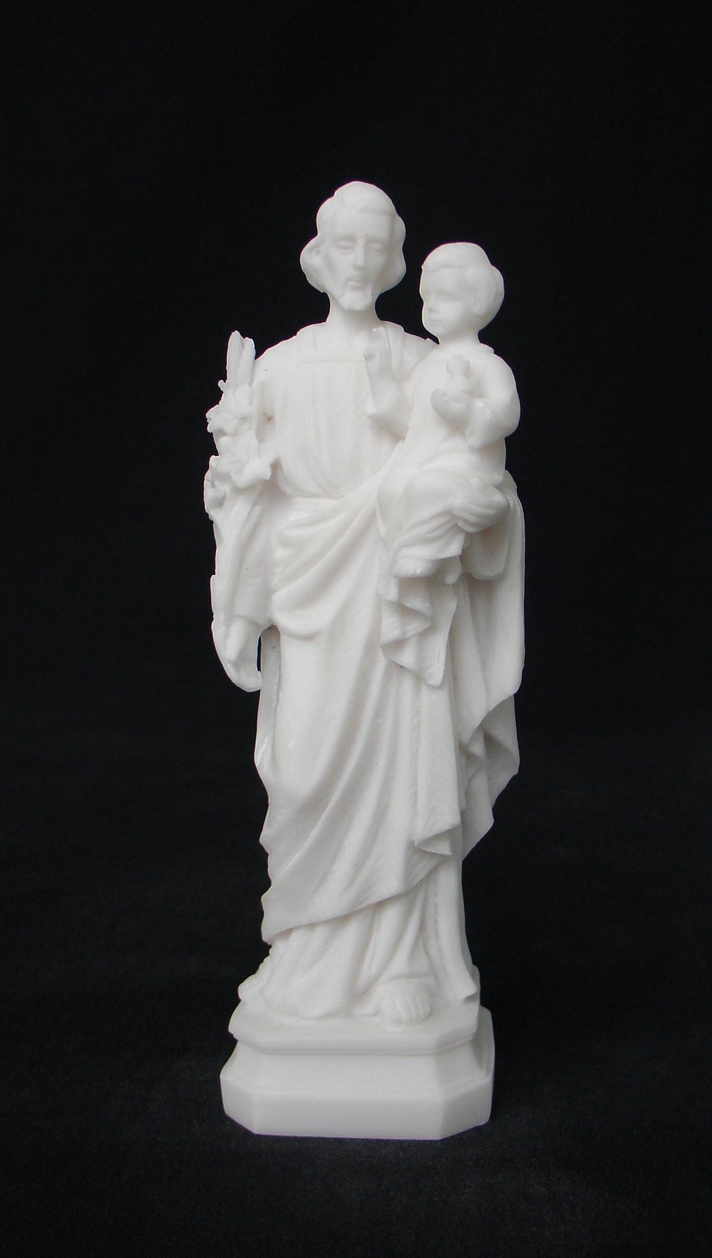 Saint Joseph holding baby Jesus in his hand — image 2