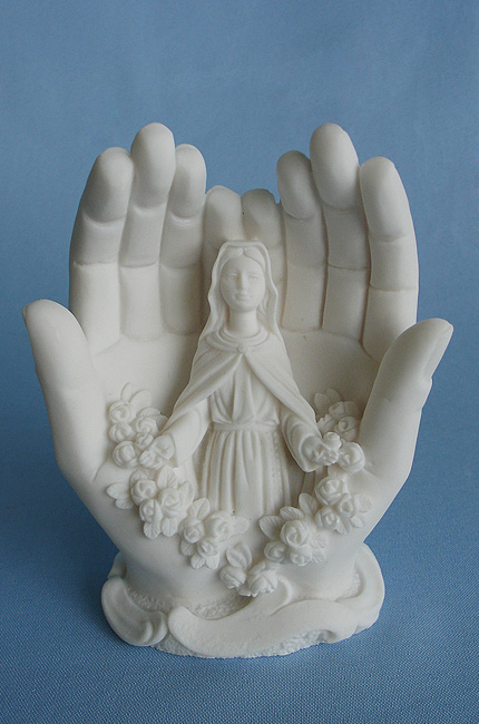 Virgin Mary inside hands