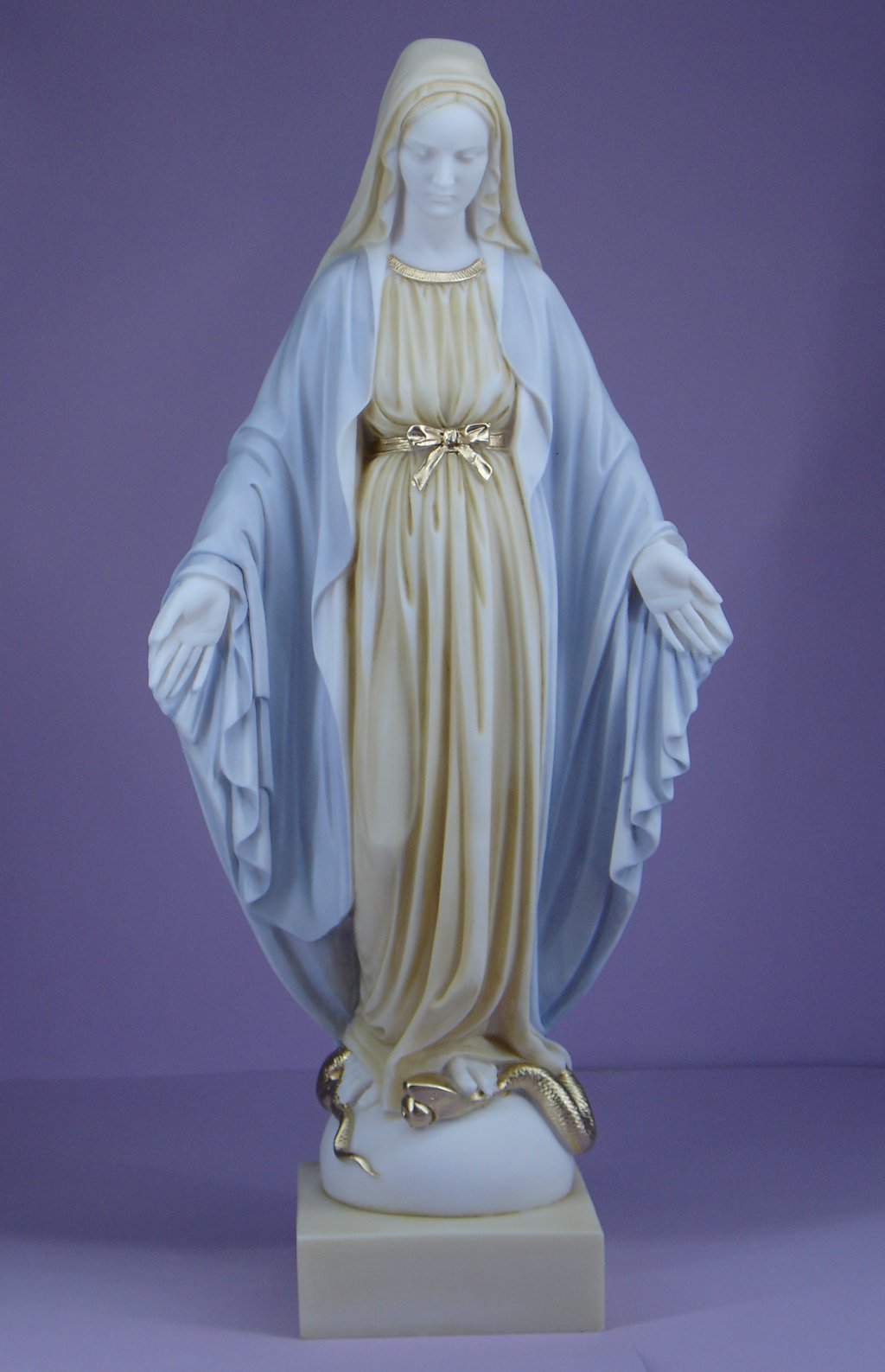 Virgin Mary steps on the snake statue
