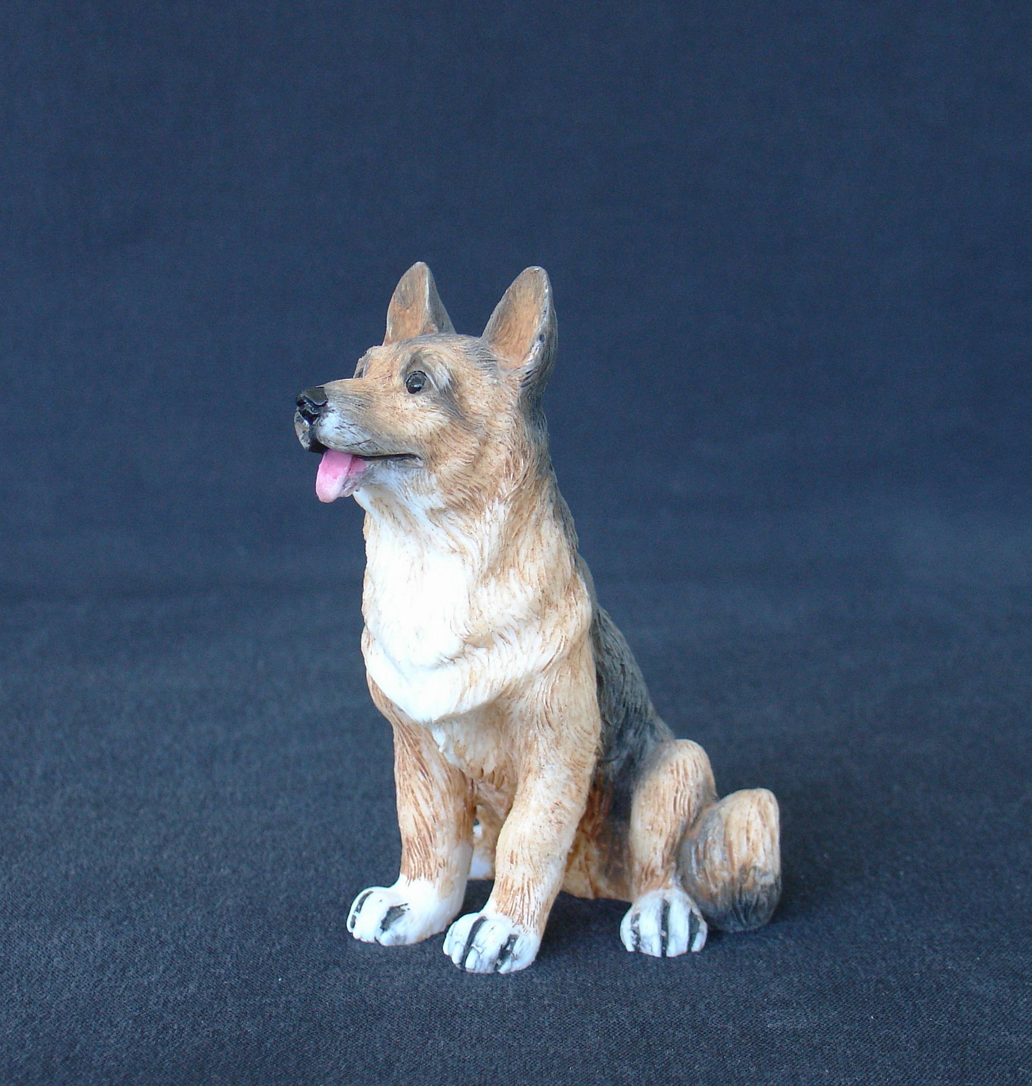 German Shepherd dog pet statue sitting on the floor